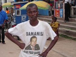 member of the electorate wears a free T-shirt from a candidate in