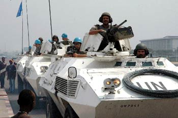 Soldiers of the United Nations peacekeeping force in the Democratic Republic of Congo (DRC) patrol on a street in Kinshasa, DRC's captial, July 29, 2006. A 17,000-strong UN peacekeeping force is stationed in DRC to secure the country's first presidential and legislative elections, scheduled on July 30. 