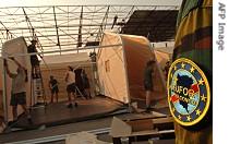 Belgian troops prepare tents at the new EUFOR base at N'Dolo Airbase, Kinshasa