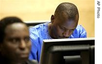 Thomas Lubanga (r)in the International Criminal Court in The Hague