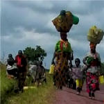 Congolese civilians fleeing Laurent Nkunda's rebels