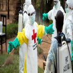 Finnish Red Cross/Maria Santto Rinsing Ebola protective gear in Beni, Democratic Republic of the Congo. (31 May 2019).