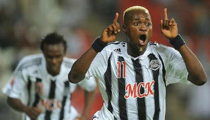 TP Mazembe's Mulota Kabangu celebrates after scoring against SC Internacional of Brazil in the semi-final of the FIFA Club World Cup 2010 in Abu Dhabi