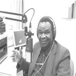 Dr. Lopold Kumbakisaka au cours d'une prsentation des informations. Radio-Canada (Journa ...